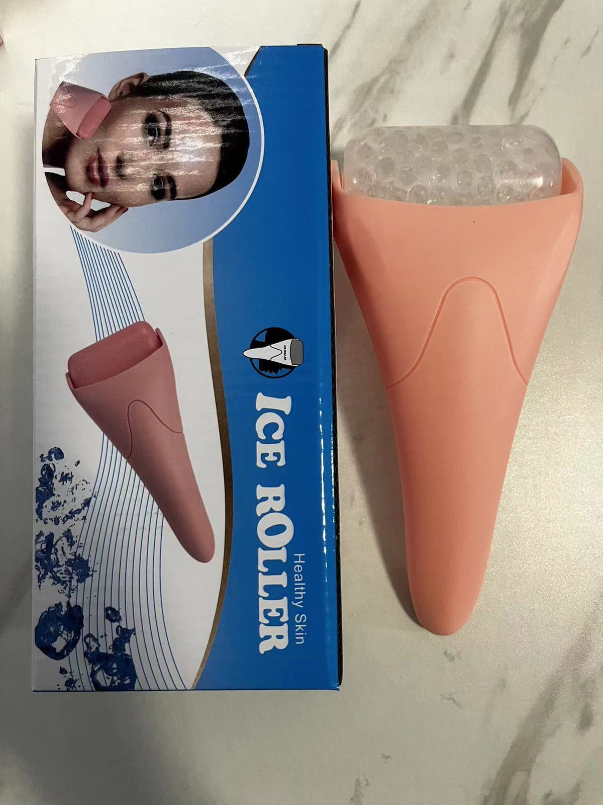 Rouleau de massage pour le visage avec billes de froid