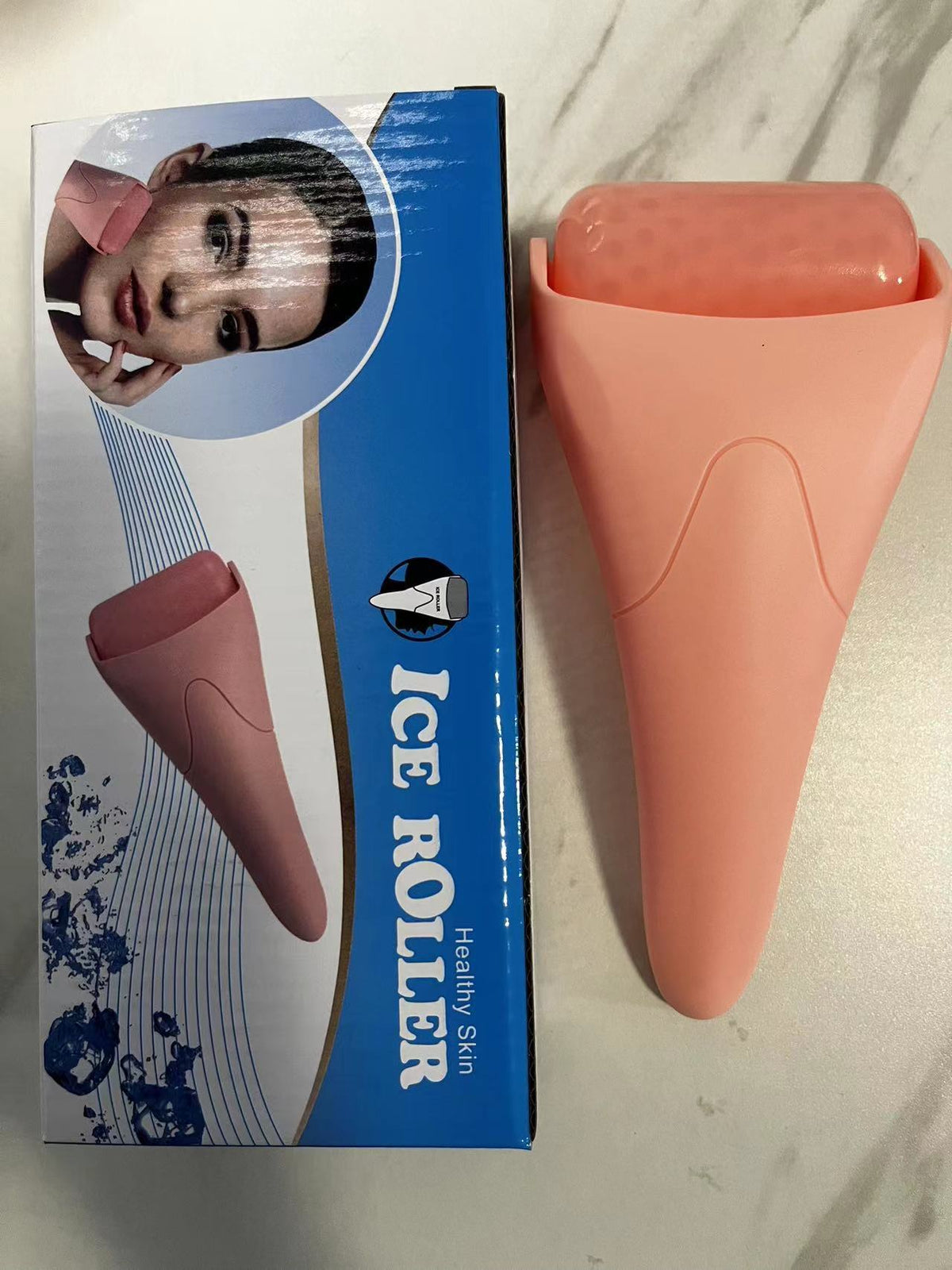 Rouleau de massage pour le visage avec billes de froid