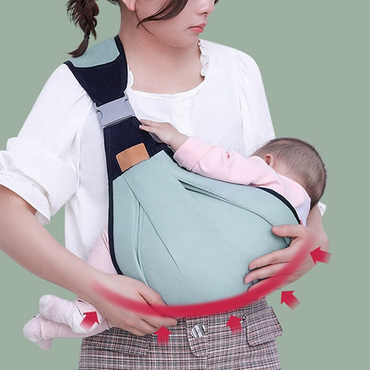 Babytrage als Schulterschlinge